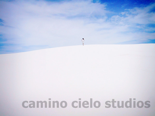 white sand blue sky